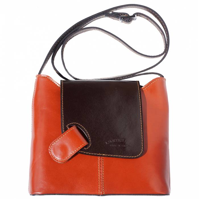Patent shoulder bag with fold over flap closure and magnetic clasp
