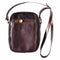 Small travel bag with shoulder strap in genuine cow leather